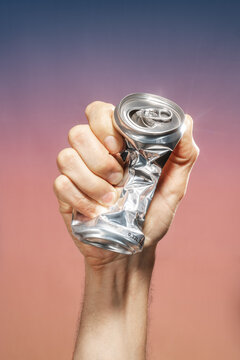 Hand crushing aluminum can