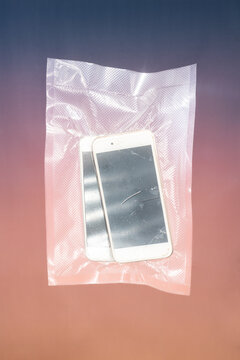  Broken smartphones sealed in plastic bag