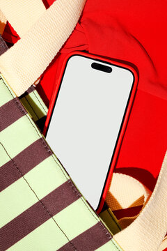 Smartphone in Tote Bag with Blank White Screen Mockup