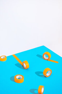 Orange tapes on blue.