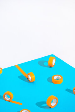 Orange tapes on blue.