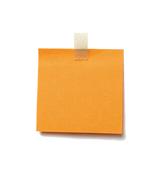 orange sticky note with duct tape isolated 