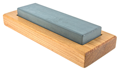 an old whetstone fixed in a wood isolated on transparent background
