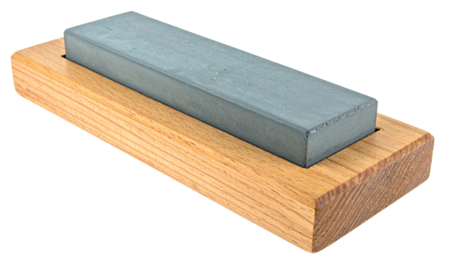 an old whetstone fixed in a wood isolated on transparent background