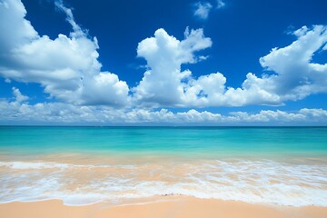 Obraz premium Serene tropical beach scene under a vibrant blue sky with fluffy white clouds gentle waves lapping on a sandy shore