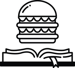 book with a hamburger on top of it