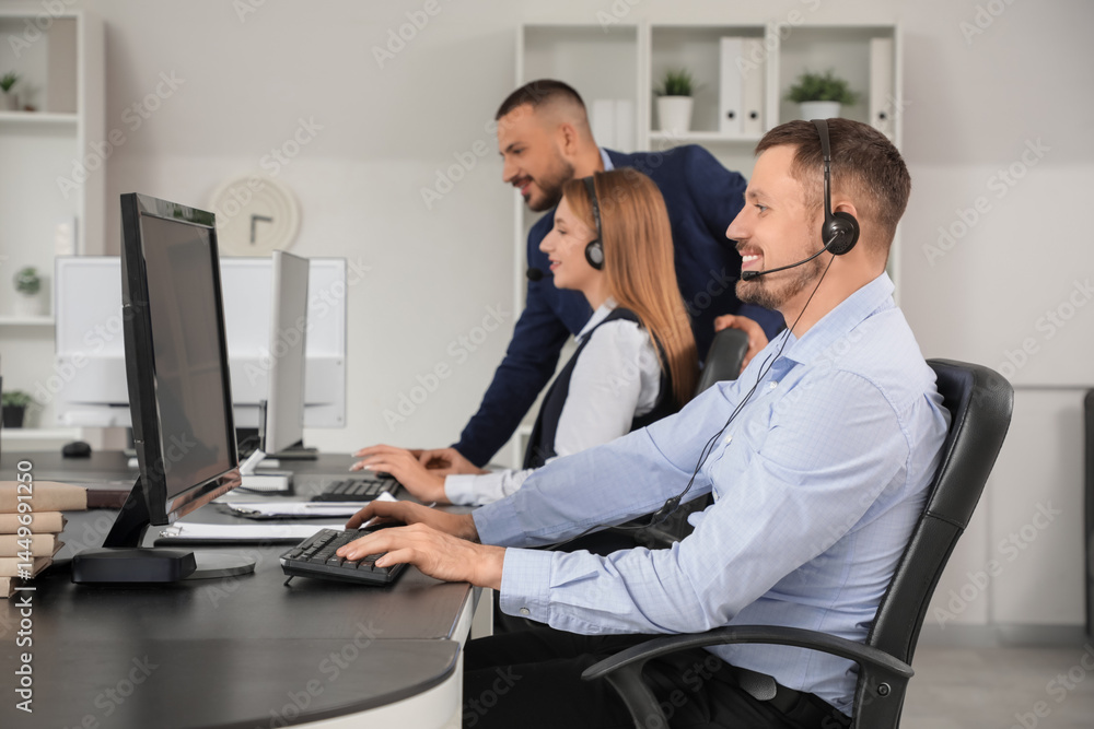 Poster technical support agents working in office