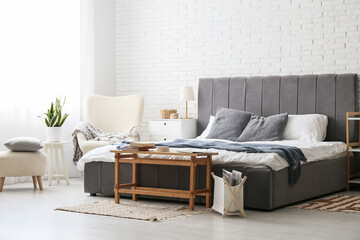 Interior of comfortable modern bedroom