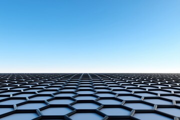 Fototapeta premium Hexagonal surface pattern. Geometric grid with metallic hex shapes under blue sky