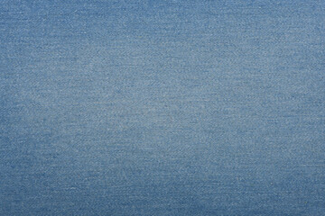 Blue denim jeans texture close up. Blue denim jeans background.