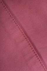 Denim fabric with yellow thread seams, denim jacket, denim pants, for background or fabric sample...