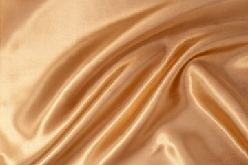 Fototapeta premium Gold fabric texture of natural for background. Luxurious canvas background.