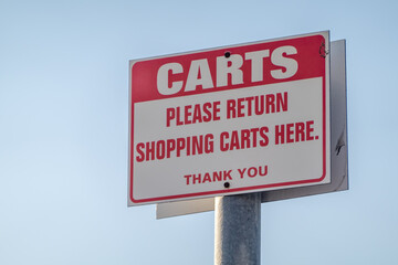 A red and white sign reads 