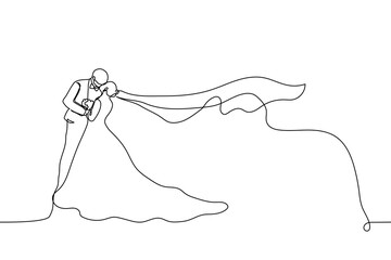 bride and groom standing kissing, bride's long veil fluttering beautifully in the wind - one line art vector. wedding kiss