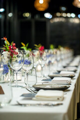 Elegant Dinner Table with Floral Decorations