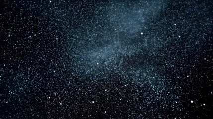 Obraz premium Vast expanse of the night sky, filled with countless twinkling stars. A breathtaking view of the cosmos.