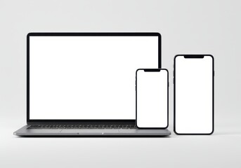 Laptop and two smartphones with blank white screens against a plain background for digital mockup purposes