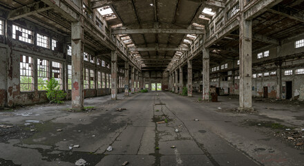 Abandoned industrial space highlighting economic shocks and decay  