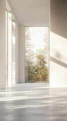Fototapeta premium Modern interior with a large window showcasing a tranquil forest scene.