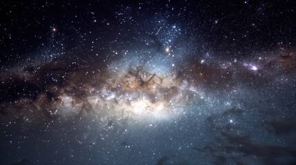 Obraz premium A breathtaking view of the Milky Way galaxy, showcasing its vibrant colors and cosmic dust. An awe-inspiring sight of the universe.