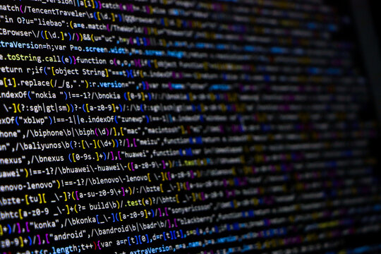 Programming code on computer screen. Developer working on program codes in office. Source code photo