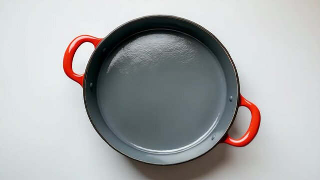 Above perspective of an empty pot on a plain background