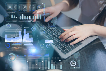 Woman sitting in cafe using computer laptop analyse business data charts working with virtual data...