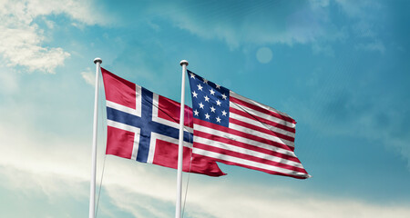 Norway and America friendship flags are waving in the sky.Two country flag for agreement or deal. Norway USA national flag for comittment.