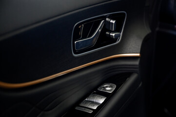 Car door with door handle and window control and adjustment button