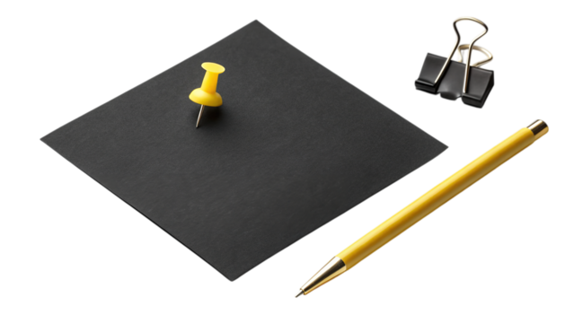 A lone yellow pushpin anchors a dark square note, ready for ideas, accompanied by a sleek yellow pen and a simple black binder clip against a clean white background.