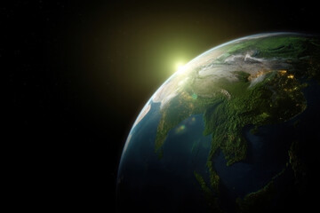 Fototapeta premium Sunrise over Earth from space showing Asia with illuminated cities and green land, capturing beauty and vastness of planet in cosmic view