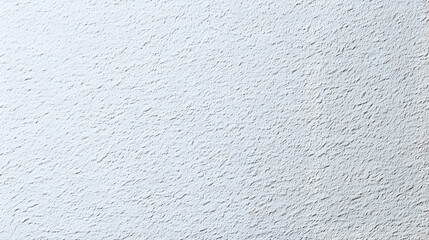 Textured white wall with subtle patterns evoking a sense of calm and simplicity in modern architecture