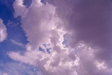 A cloudy sky with a blue sky in the background