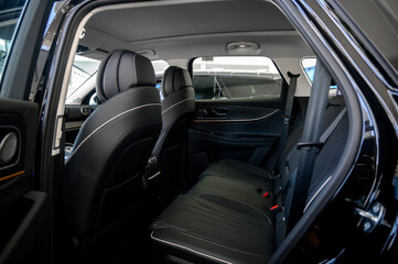 Interior of a modern car with black leather seats