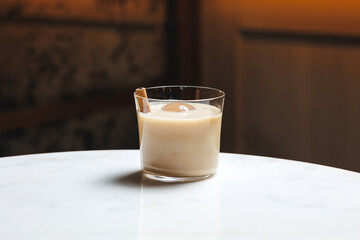 Chic serving of cocktails at the bar, Brandy, whiskey, apricot, orange