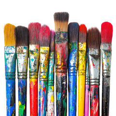Fototapeta premium Collection of used paintbrushes, various colors and sizes, showing vibrant pigments and paint splatters on the bristles and handles