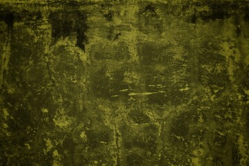 cracked wall background with yellow rays, Background with an old concrete wall with an orange cracked paint lit by sun rays