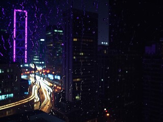 Purple Neon Rain Cityscape at Night