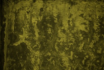 cracked wall background with yellow rays, Background with an old concrete wall with an orange cracked paint lit by sun rays