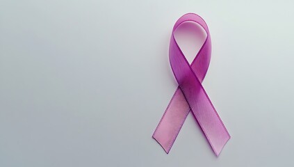 A purple ribbon symbolizing cancer awareness, isolated on a white background