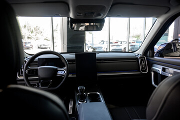 Car interior - steering wheel, shift lever and dashboard. Car modern inside.
