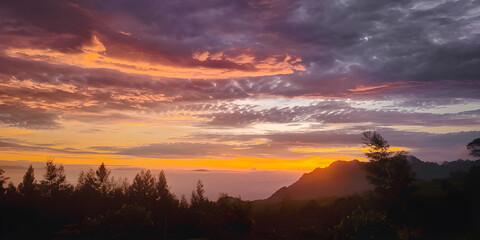 Obraz premium The sky is a beautiful orange and purple color over mountain forest landscape