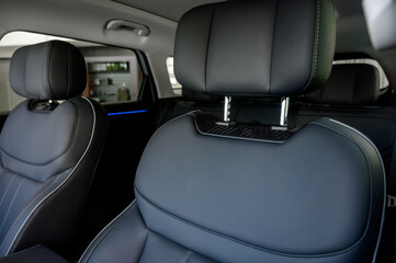 Interior of a modern car with black leather seats