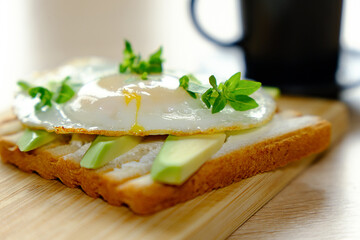 Enjoy a Healthy Breakfast Toast topped with Creamy Avocado and a Perfectly Poached Egg