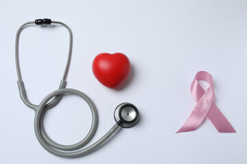 pink ribbon, stethoscope on a white background