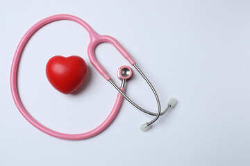 pink ribbon, stethoscope on a white background