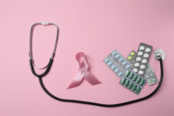 stethoscope, large pile of multi-colored pills in blister pack disposable , close-up, side view