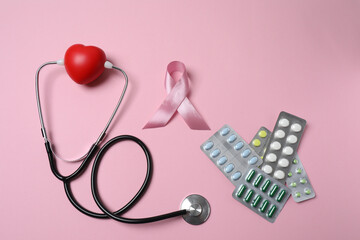 stethoscope, large pile of multi-colored pills in blister pack disposable , close-up, side view
