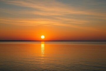 Fototapeta premium Serene sunset over calm water.