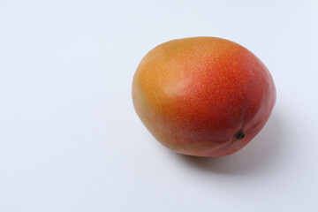mango with leaves on a white background